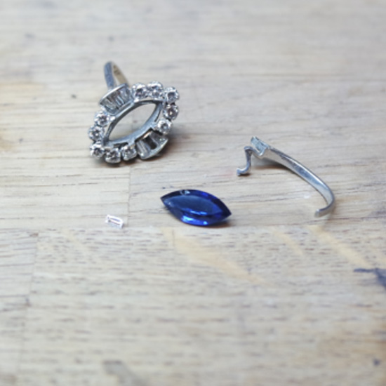 sapphire and diamond ring being repaired