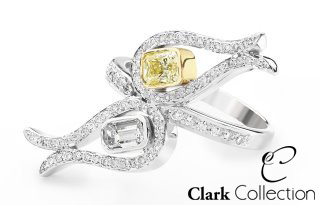 Bespoke Platinum ring with white emerald cut white and yellow diamonds